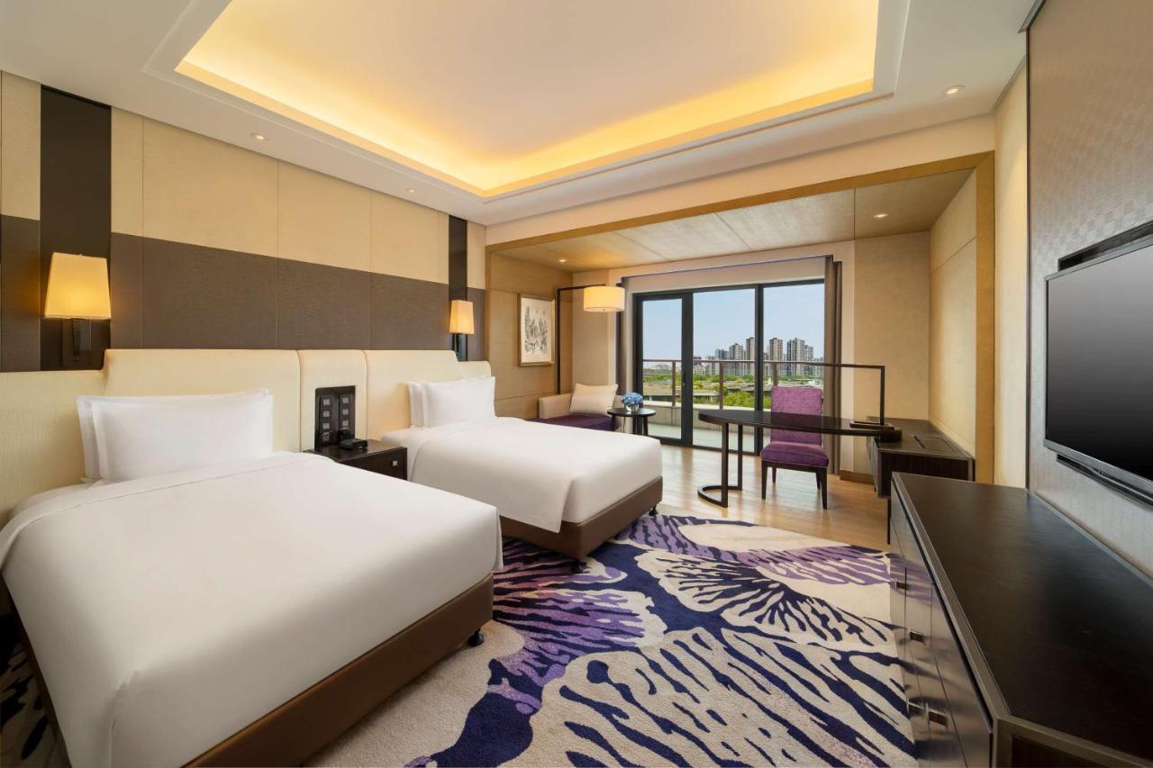 Radisson Blu Hotel Wuhan Etd Zone Экстерьер фото