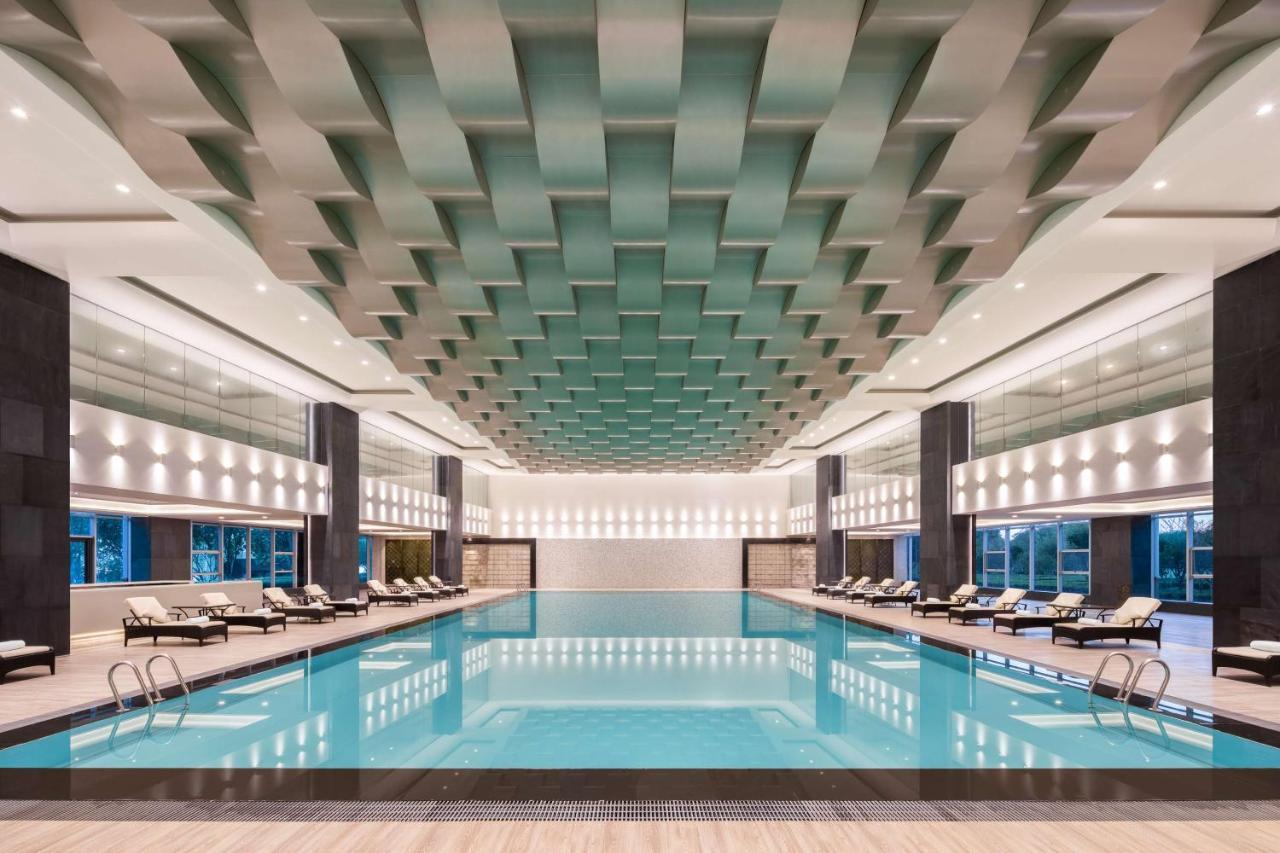 Radisson Blu Hotel Wuhan Etd Zone Экстерьер фото